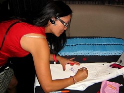 joyce chow signing wizard jeans for charity.jpg